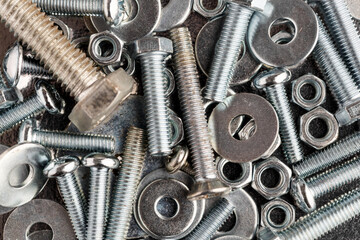 Mixed screws and nails. Industrial background. Home improvement.bolts and nuts.Close-up of various...
