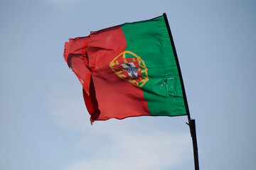 portugal flag waving in Aveiro lagoon Ria de Aveiro located on the Atlantic coast of Portugal