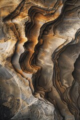 Close-up of a rock formation sculpted by the ocean waves, with intricate patterns and textures revealed by the sunlight