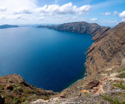 The imploded caldera of the Santorini volcano. Hiking trail to Oia, Thira island, Santorini, Cyclades islands, South Aegean Sea, Greece