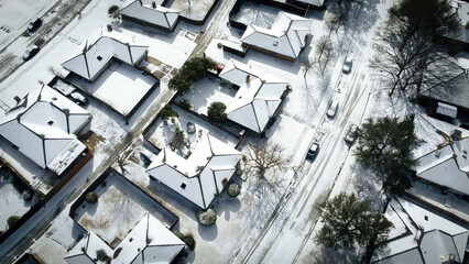 Toned photo residential streets and row of single-family houses covered in snow after severe...