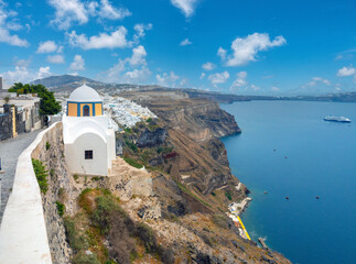 Gorgeous orthodox church hanging in the very rim of the Santorini caldera, Fira, Thira island,...