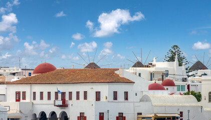 Rooftops, wind mills and white washed houses in  the old town of Mykonos, Cyclades Islands, Aegean...