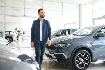 Man adult customer male buyer client wears chooses auto