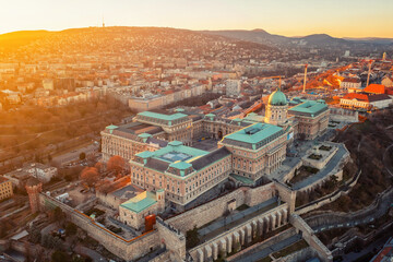 Sunset view of parliament, buildings and city. Dramatic evening view in Budapest, Hungary, Europe.