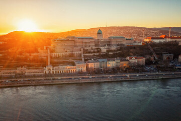 Sunset view of parliament, buildings and city. Dramatic evening view in Budapest, Hungary, Europe.