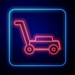 Glowing neon Lawn mower icon isolated on black background. Lawn mower cutting grass. Vector