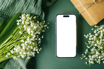 Phone with isolated screen and lilies of the valley
