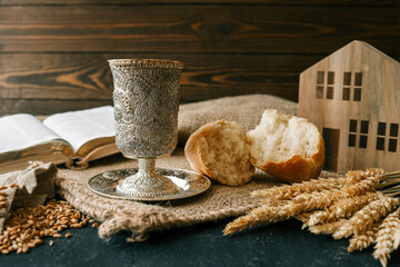 Cup with wine and bread close-up, Christian communion
