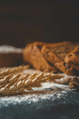 Sliced rye bread on cutting board. Whole grain rye bread with seeds