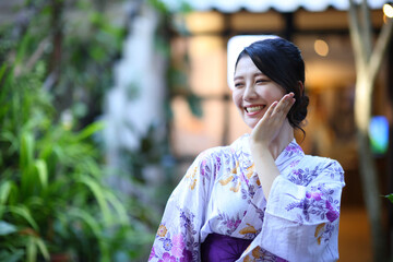 portrait woman with yukata dress in the garden