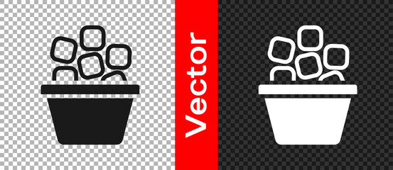 Black Ice bucket filled with ice cubes icon isolated on transparent background. Vector