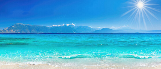 Obraz premium A beautiful blue ocean with a bright sun shining on it