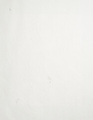 A minimalist white wall with subtle textures, embodying simplicity and elegance. Ideal for backgrounds or overlays