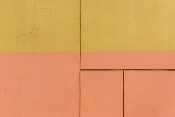 Close-up of the wall of a house , forming rectangles that looks like an abstract painting.Painted...