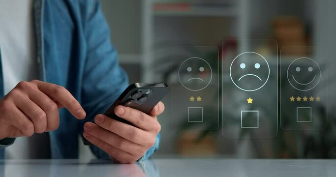 Close-up of hands and smartphone, evaluation of the quality of service,store,service,services in network and social networks. Rating assessment and customer service satisfaction. Feedback rating app