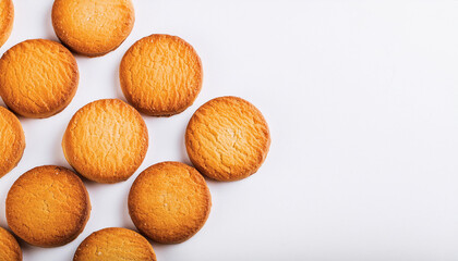 Freshly baked round cookies on white table. Tasty food. Delicious snack. Homemade bakery. Top view