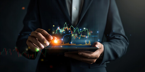 A businessman interacts with advanced financial charts on a tablet, demonstrating dynamic stock market analysis tools.