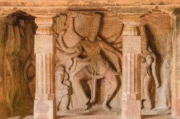 Sculpture or carving of dancing Shiva with Parvati and Saptamatrikas, Ravana padi Cave Temple Complex, Aihole, Badami, Karnataka, India.