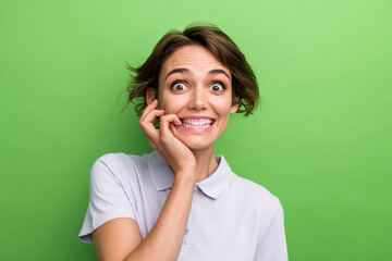 Photo of laughing looking camera funny young cute woman biting nails acting grimace she nervous...