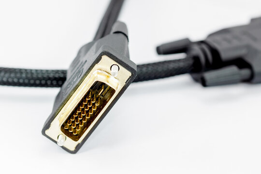 Brass VGA or DVI cable on white background