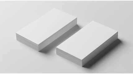 Sleek and clean white paper stacks perfect for mockup designs in a minimalist setting