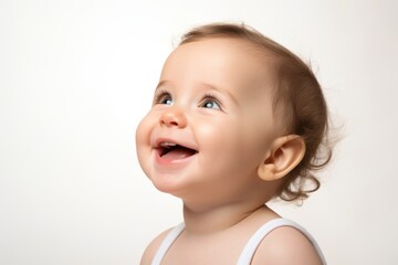 Joyful portrait of a young Asian toddler laughing, with curly hair and bright eyes, showcasing pure happiness and innocence on a light background


Childhood joy, toddler laughter, innocent 