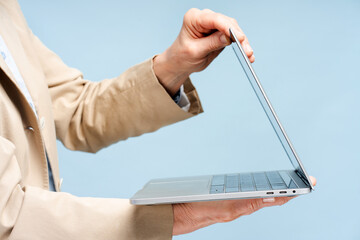 Senior woman hands opening laptop computer working online isolated