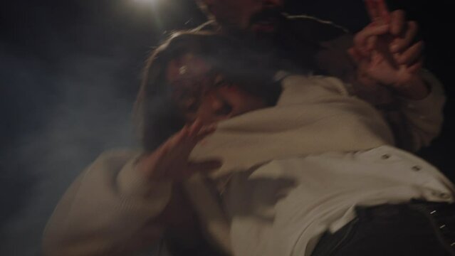 Injured woman being dragged from her car