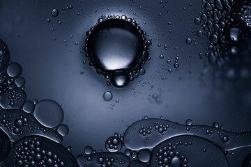 water drop on glass, dark abstract background
