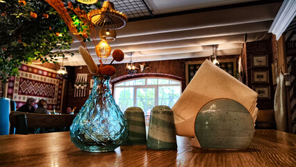 Artistic Table Setting Inside a Cozy Cafe During Daytime