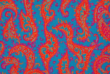 Bright and colorful paisley patterns seamlessly integrated into soft cotton fabric. AI generated.