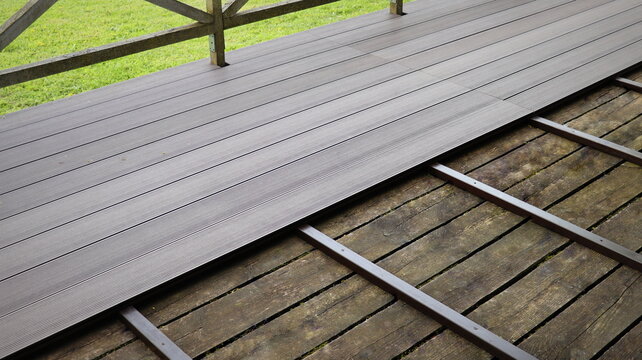 Outdoor plastic composite brown floor. Renovation terrace