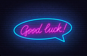 Good Luck Neon Text on brick wall  background.