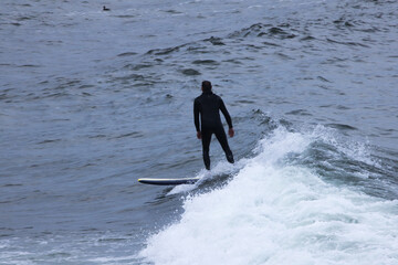 Surfer riding the ocean waves