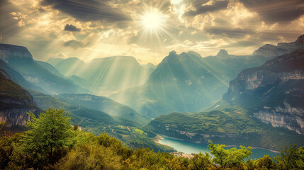 the sun shines through the clouds over a mountain landscape.