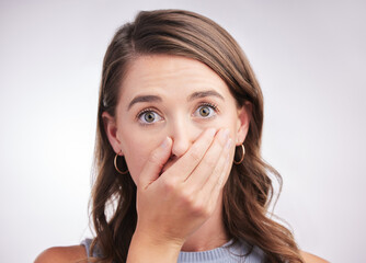 Woman, studio or shock with hand in portrait for news, surprise or concern for gossip. Female model or white background with fingers on mouth and speechless, reaction for announcement or notification