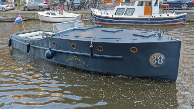 Vintage Boat Tours at Water Canal in Amsterdam Netherlands