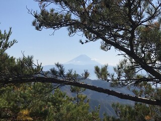 photo taken from another mountain overlooking mount fuji