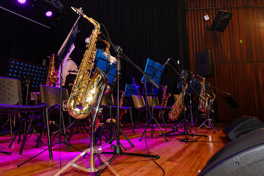 A group of musicians are playing instruments on stage
