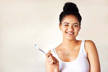Smile, oral health and portrait of woman with toothbrush for morning hygiene routine in studio....