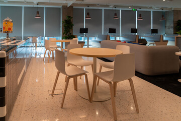 Interior of modern empty office building.Open ceiling design.Equipped with automatic lifting table and LCD screen.