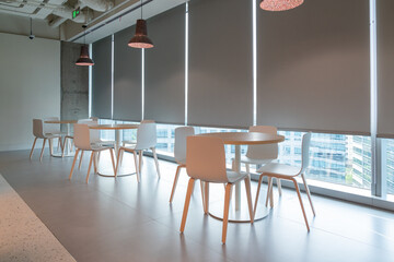 Interior of modern empty office building.Open ceiling design.Equipped with automatic lifting table...