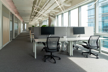 Interior of modern empty office building.Open ceiling design.Equipped with automatic lifting table...