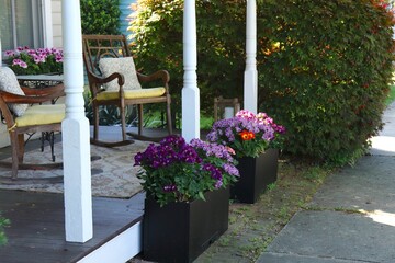 Porch Decor with Rocking Chairs and Flowerpots