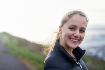 Portrait, happy or woman hiking on outdoor adventure to explore on holiday vacation in Germany....