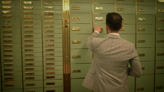 Businessman Entering Bank Safe Vault Room Storing Silver Bullion Inside Deposit