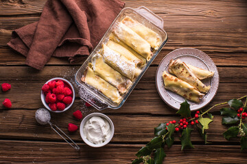 Crepes with farm cheese , homemade traditional Ukrainian dish nalysnyky