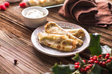 Crepes with farm cheese , homemade traditional Ukrainian dish nalysnyky