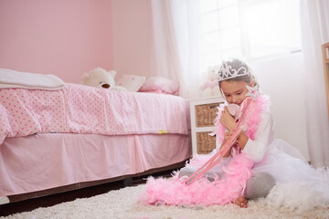Child, bedroom and princess costume or happy for dress up in home or playing pretend, game or...